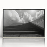 Mid-century modernist art of a spiral staircase in muted gray tones, acrylic print framed in silver.
