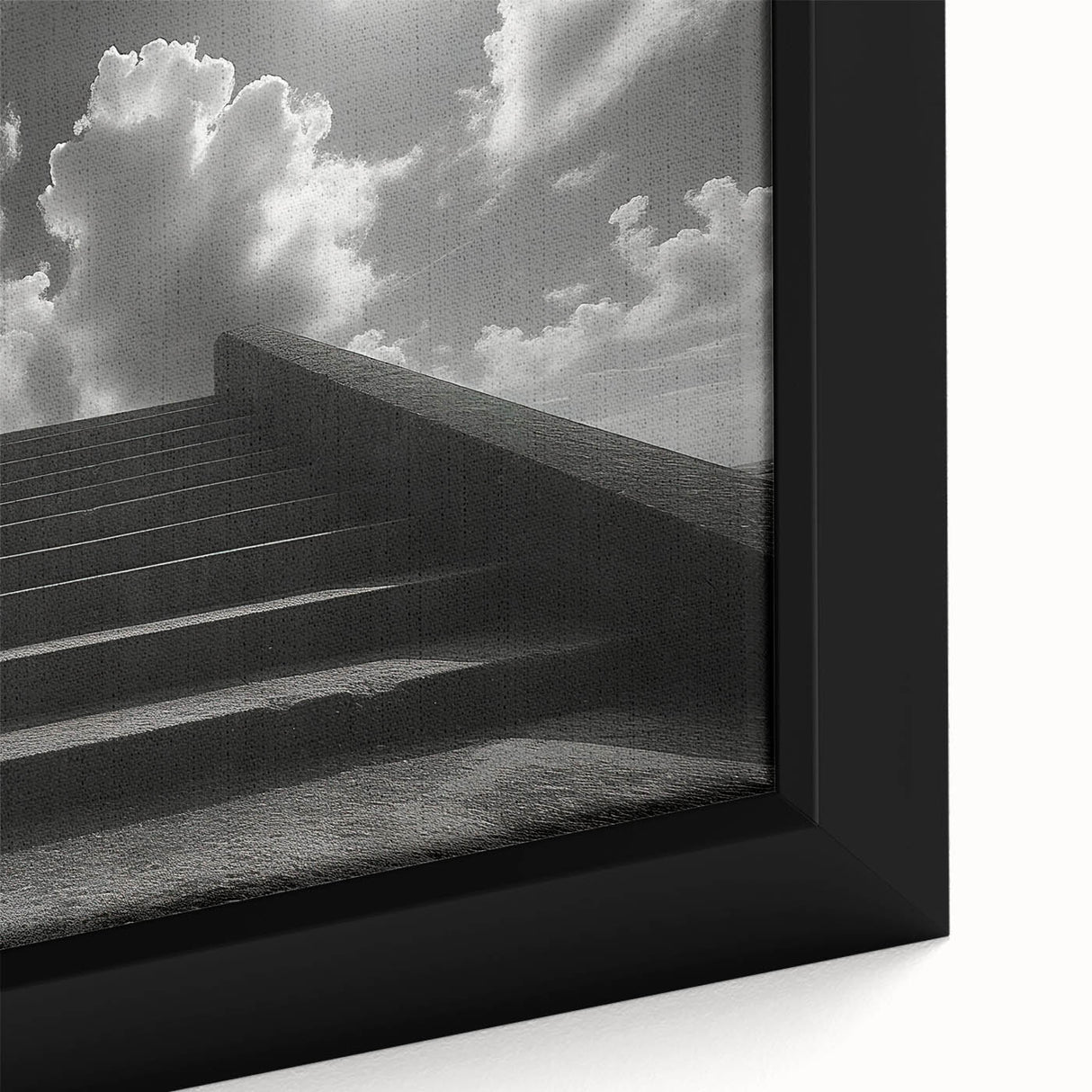 Close-up of a black wall art featuring a colorful, textured staircase design on a framed canvas, ideal for living room decor.
