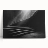 Black and white photograph of a spiral staircase on stretched canvas, suitable as large art for kitchen or bedroom.