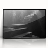 Large abstract wall art featuring a spiral staircase design in black and white tones, acrylic print framed in black.