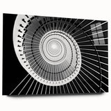 Large abstract wall art of a spiral staircase in monochrome, acrylic glass print, ideal for bedroom or dining room decor.