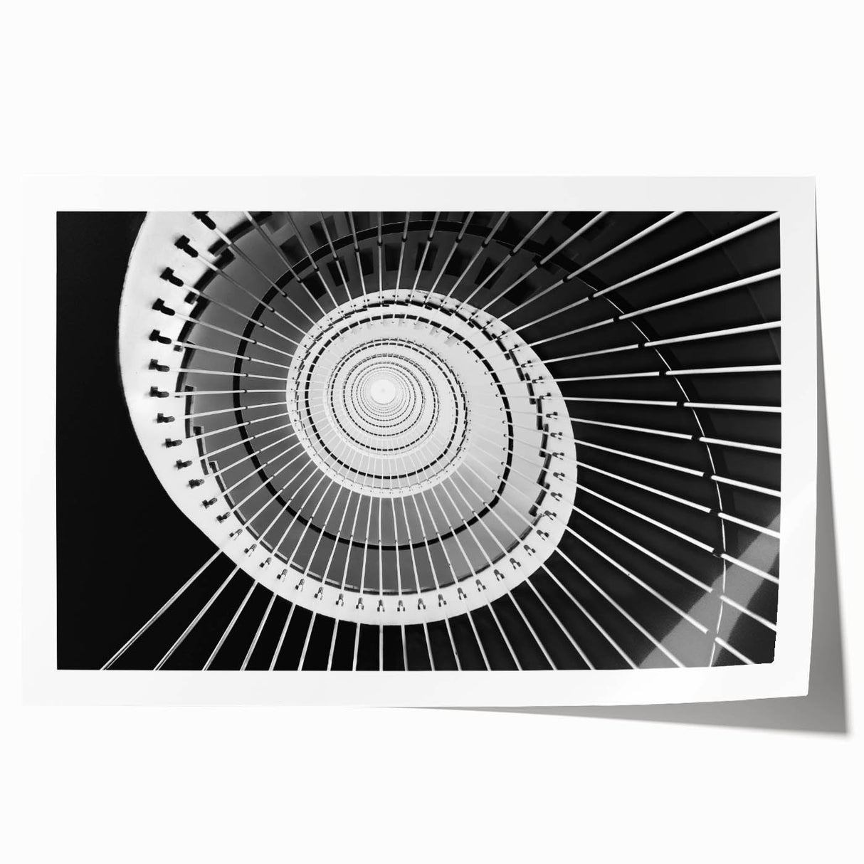 Rolled print of a spiral staircase in grayscale, ideal for art wall dining room or classy bathroom wall art.