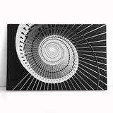 Black and white photograph of a spiral staircase on stretched canvas, ideal for kitchen wall art or bedroom ambiance.