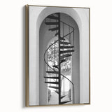 Framed canvas featuring a vintage poster of a spiral staircase in black and white, ideal for bedroom wall art.