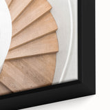 Close-up of a black wall art featuring a colorful, textured staircase design on a framed canvas.