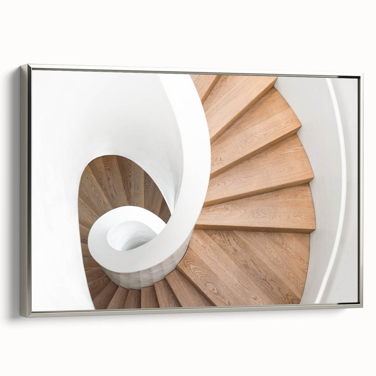 Framed canvas featuring a black and white vintage staircase design, ideal for adding depth to office spaces.