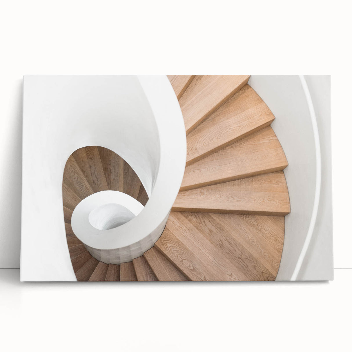 Black and white photograph of a spiral staircase on stretched canvas, suitable as kitchen wall art or for a bedroom.