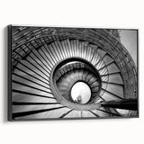 Black and white framed canvas of a spiraling staircase, ideal for bedroom wall decor.