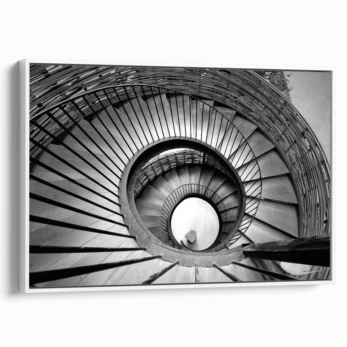 Extra large framed canvas of a vintage poster art depicting a black and colorful spiral staircase.