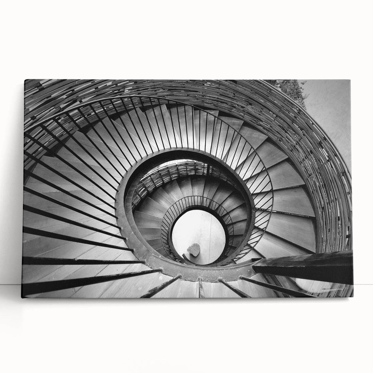 Black and white photo of a spiral staircase on large stretched canvas, suitable for kitchen wall art.