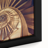 Black wall art featuring a close-up view of a spiral staircase with colorful, textured accents on framed canvas.