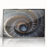 Mid-century modernist art featuring a spiral staircase in muted gray tones, silver-framed acrylic.
