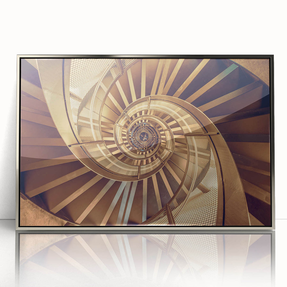Mid-century modernist art featuring a spiral staircase in black and white tones, framed in silver acrylic.