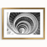 Extra large abstract art print of a spiral staircase in muted gray tones on a framed canvas, ideal for living room decor.