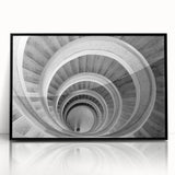 Large abstract wall art featuring a spiral staircase design in black and white, framed acrylic, ideal for modern home decor.
