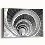 Framed canvas featuring a monochrome vintage poster of a spiral staircase, ideal for adding a classic touch to office spaces.