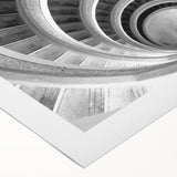 Art deco poster of a spiraling staircase in monochrome, printed on rolled canvas.