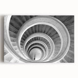 Black and white photo of a spiral staircase on stretched canvas, ideal for kitchen wall art or bedroom ambiance.