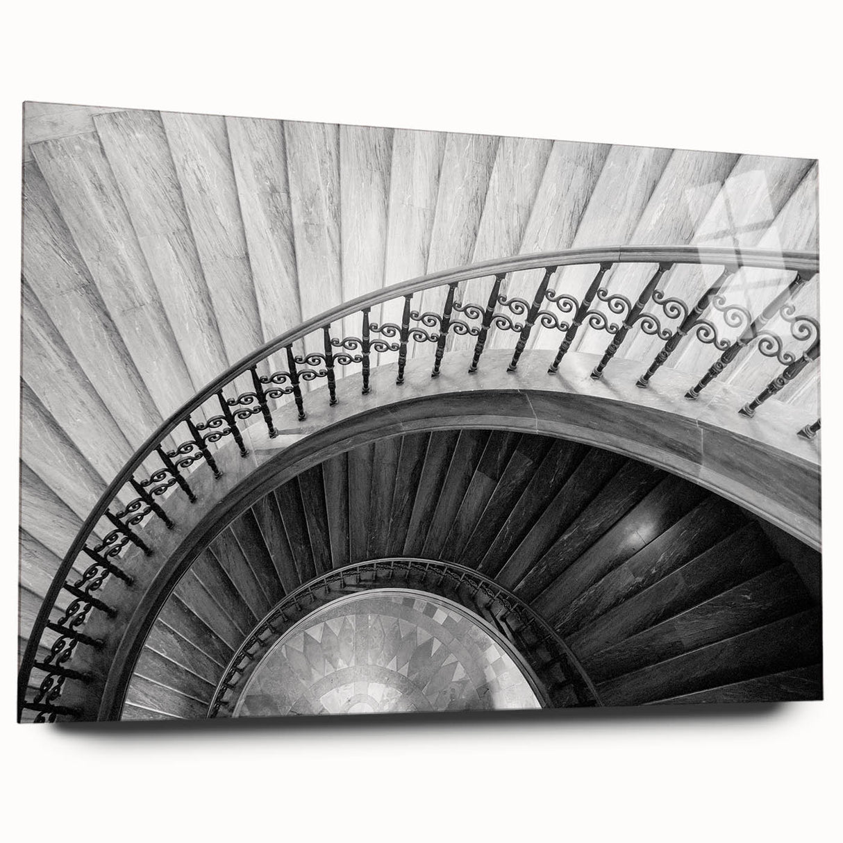 Large abstract wall art of a spiral staircase in black and white, printed on acrylic glass.