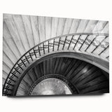 Large abstract wall art of a spiral staircase in black and white, printed on acrylic glass.