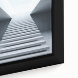 Close-up of a black wall art featuring a textured staircase design in muted colors on a framed canvas.