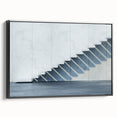 Black and white photo of a spiral staircase on framed canvas, ideal for bedroom wall art.