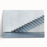 Black and white photograph of a spiral staircase on stretched canvas, ideal for kitchen wall art or bedroom ambiance.