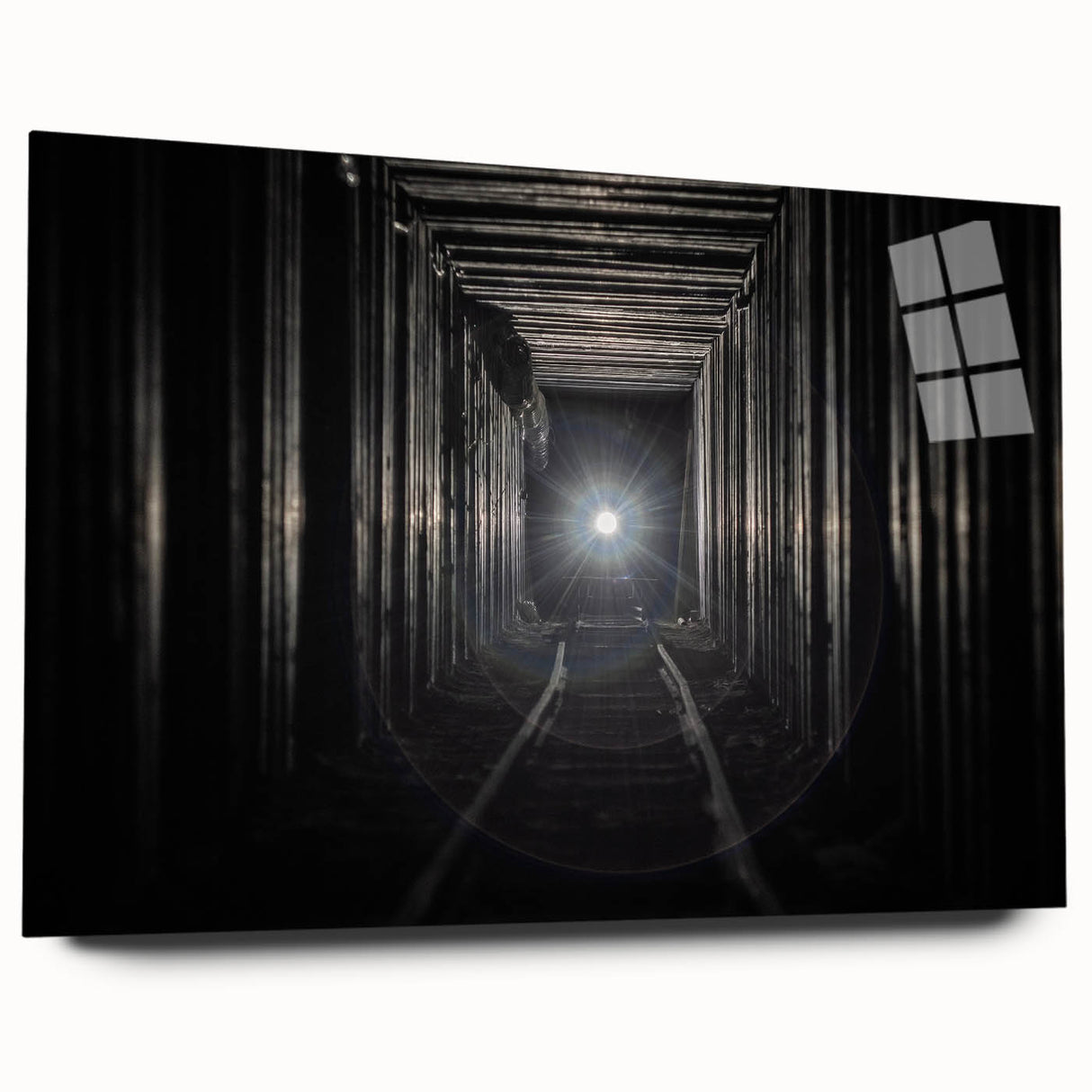 Large abstract wall art on acrylic glass depicting geometric tunnels in monochrome shades.