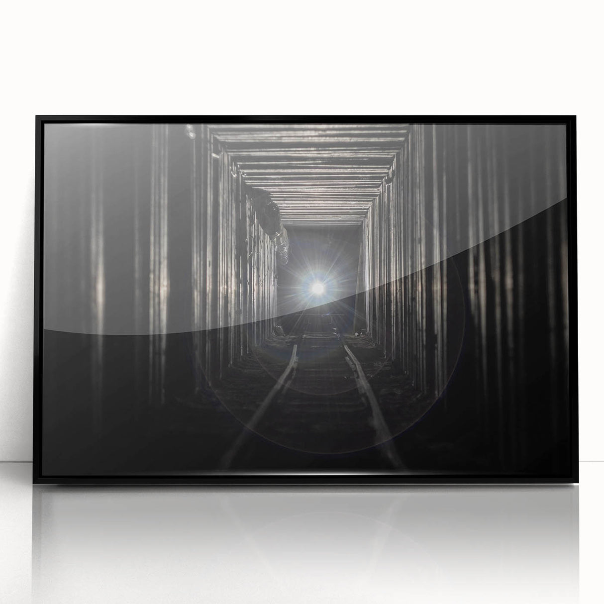 Large abstract wall art featuring a geometric tunnel design in black and white, framed acrylic.