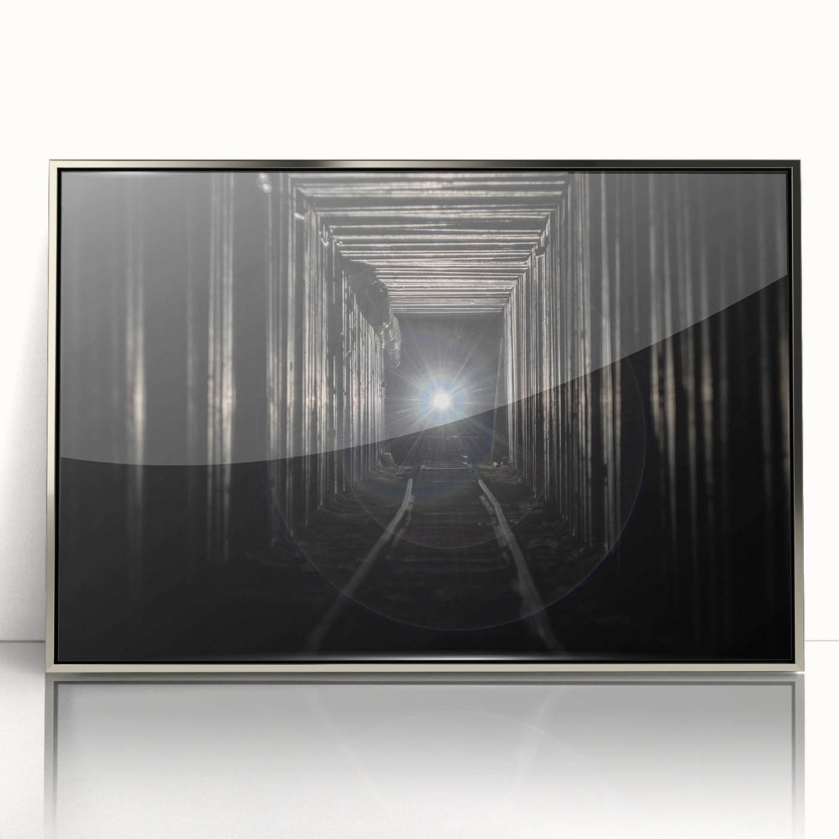 Mid-century modernist art of geometric tunnels in silver and gray tones on a framed acrylic, ideal for modern art wall decor.