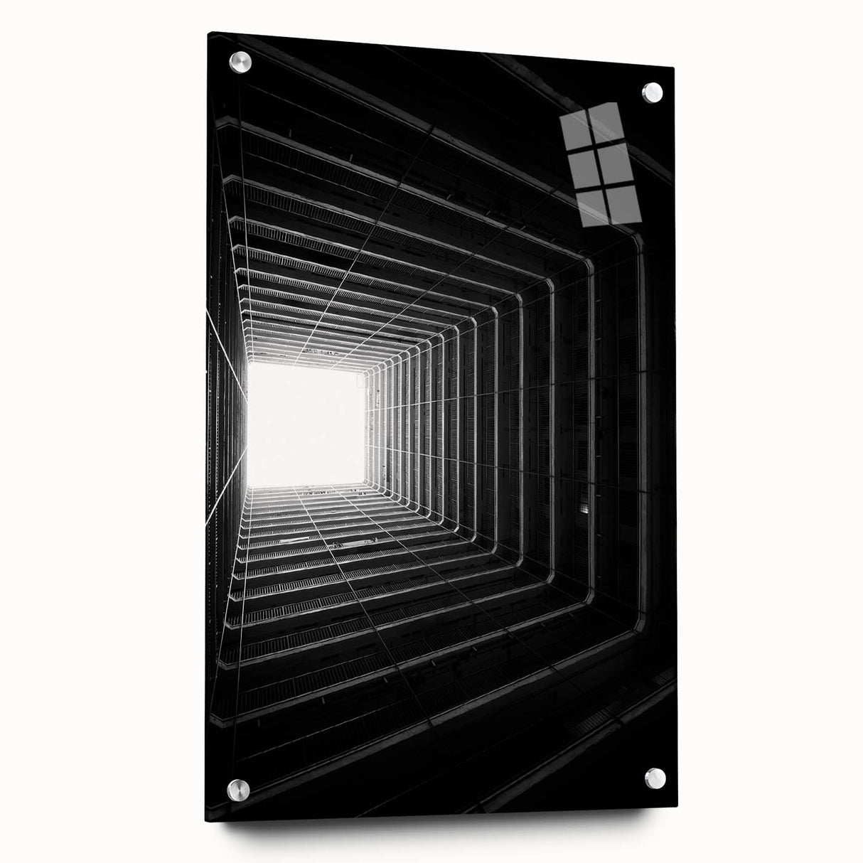 Large abstract wall art on acrylic glass showing a tunnel design in monochrome tones.