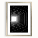 Textured abstract art print in muted gray and silver tones, framed with a silver mat, suitable for bedroom decor.