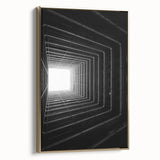 Framed canvas featuring a vintage poster art of black architectural tunnels, ideal for bedroom wall decor.
