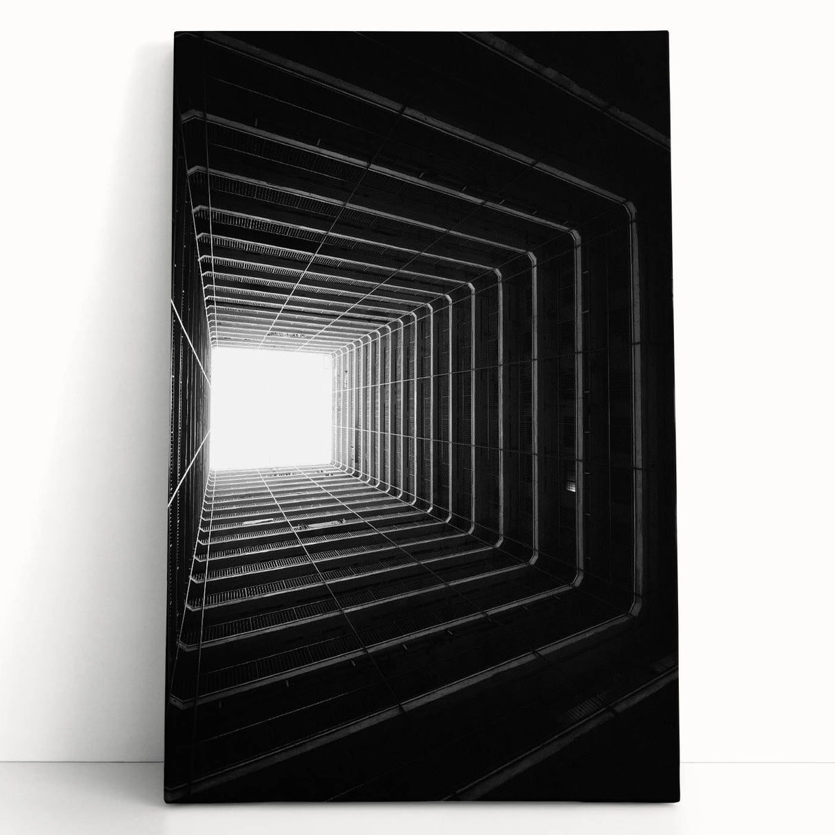 Black and white photo of architectural tunnels on stretched canvas, ideal for kitchen wall art or bedroom.