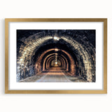 Extra large abstract art print featuring textured tunnels in muted earth tones, framed in gold, ideal for living room decor.