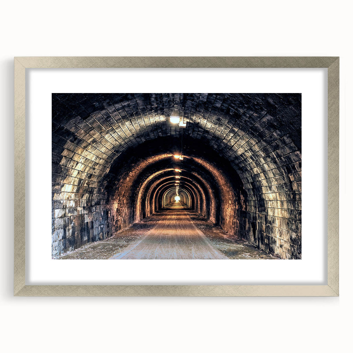 Textured abstract art print in silver frame, featuring intertwined gray and white tunnels, ideal for modern bedroom decor.