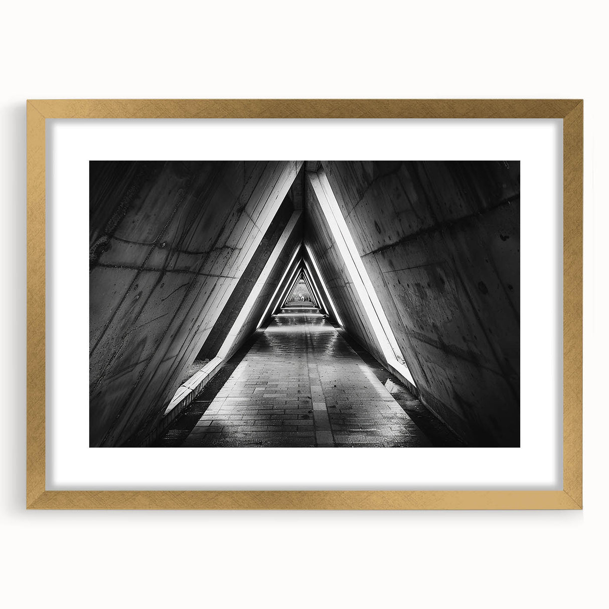 Extra large abstract art print featuring textured, swirling patterns in gold and black, framed in gold.