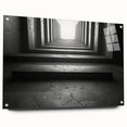 Large abstract wall art on acrylic glass depicting geometric tunnel designs in monochrome tones.