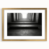 Extra large abstract art print featuring a textured tunnel design in gold and black, framed with mat.