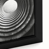 Extra large framed canvas featuring a close-up of a black architectural tunnel design with colorful, textured art accents.