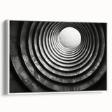 Vintage poster art featuring a black and colorful abstract tunnel design on a large framed canvas.