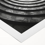 Art deco poster of a geometric tunnel design in monochrome shades on a rolled canvas, suitable for dining room walls.