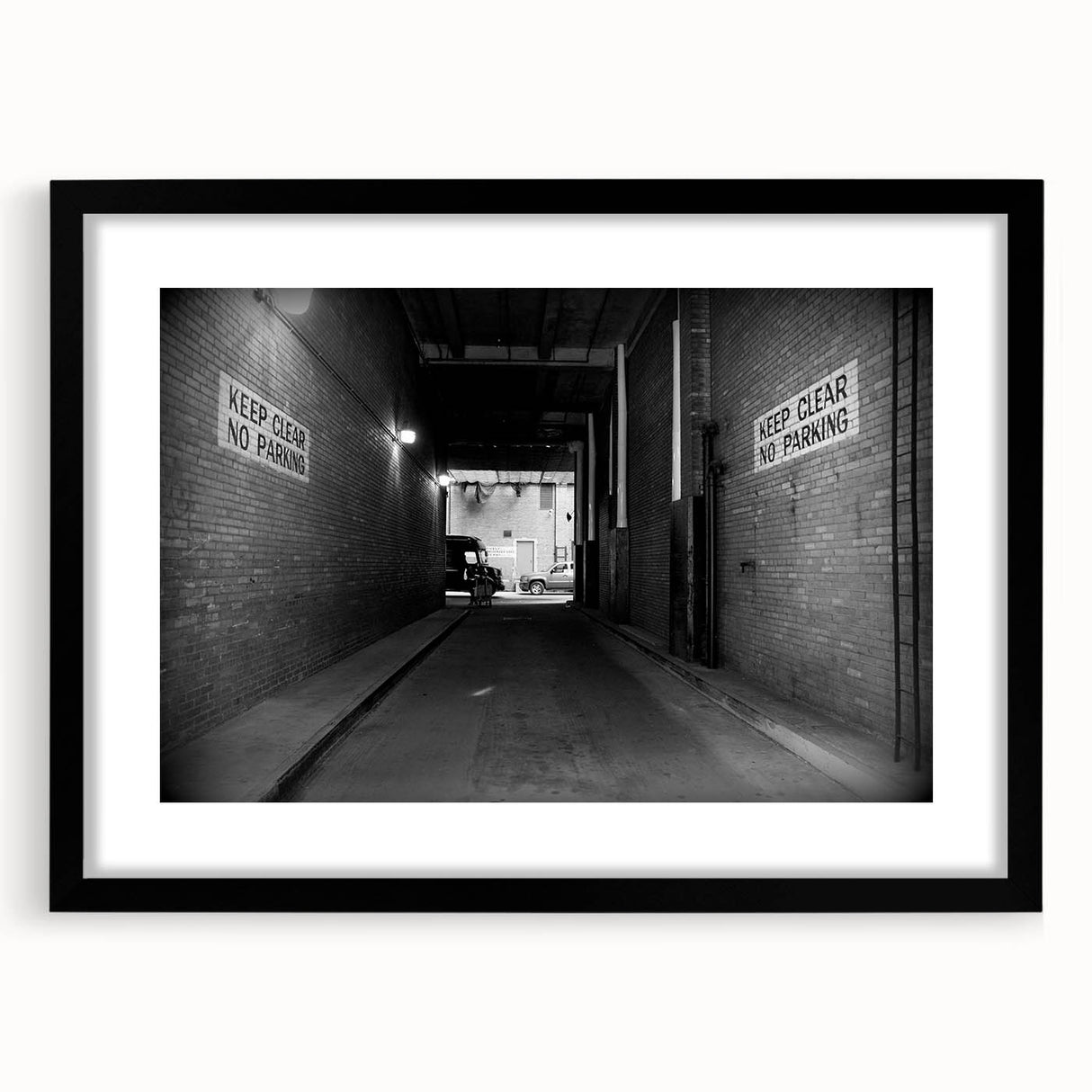 Extra large abstract art print featuring a colorful, textured tunnel design on a black framed canvas.