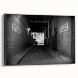 Black and white framed canvas of a vintage poster featuring architectural tunnels, ideal for bedroom wall decor.