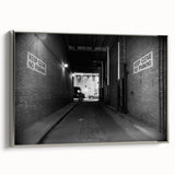 Framed canvas depicting vintage-style landscape art with colorful tunnels on a black background, ideal for home office decor.