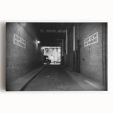 Black and white photo of architectural tunnels on stretched canvas, ideal for modern kitchen art.