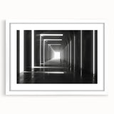 Abstract art print of intertwined tunnels in gray and white tones, framed with a white mat.