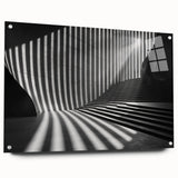 Large abstract wall art featuring a tunnel design in muted grays and blues on acrylic glass.
