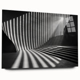 Large abstract wall art on acrylic glass, featuring swirling gray and blue tones, ideal for bedroom or dining room decor.