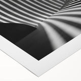 Art deco poster featuring geometric patterns in black and gold on rolled canvas, suitable for dining room wall art.